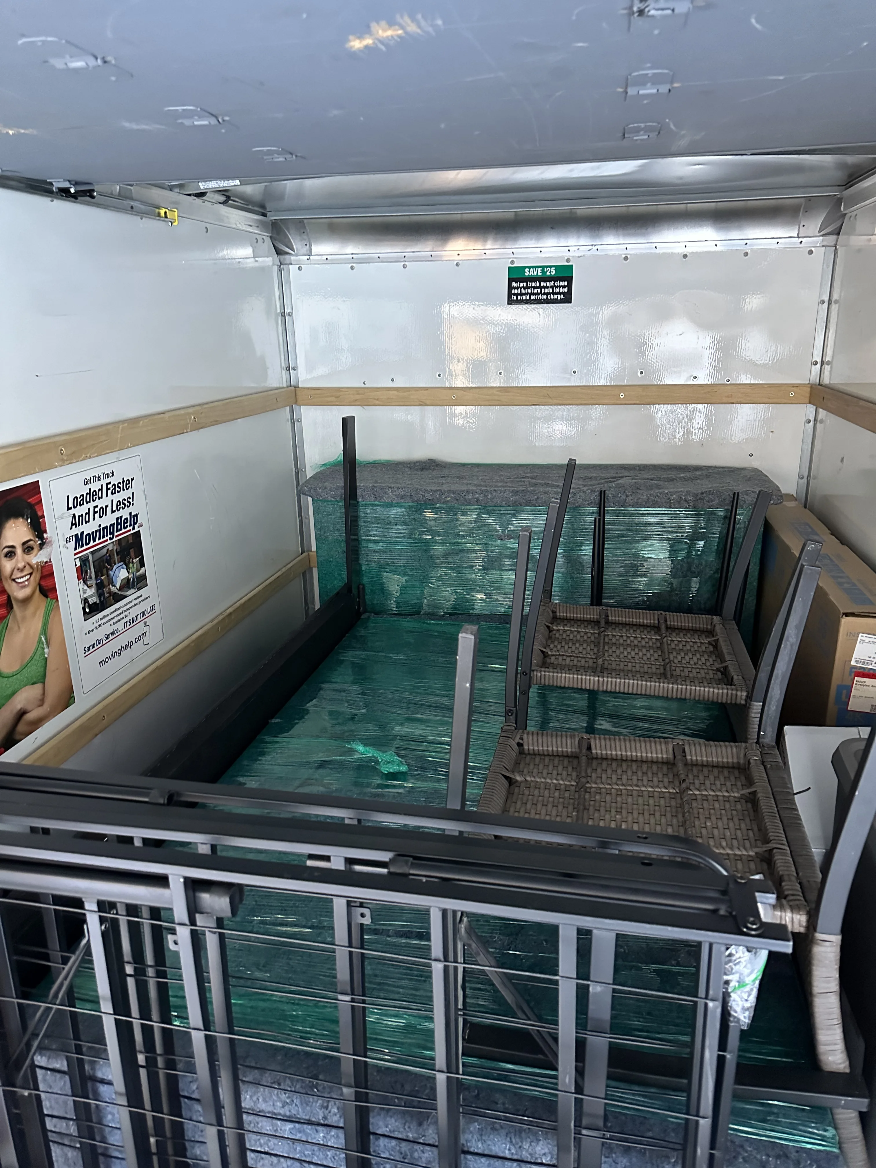 Truck interior — furniture halfway loaded