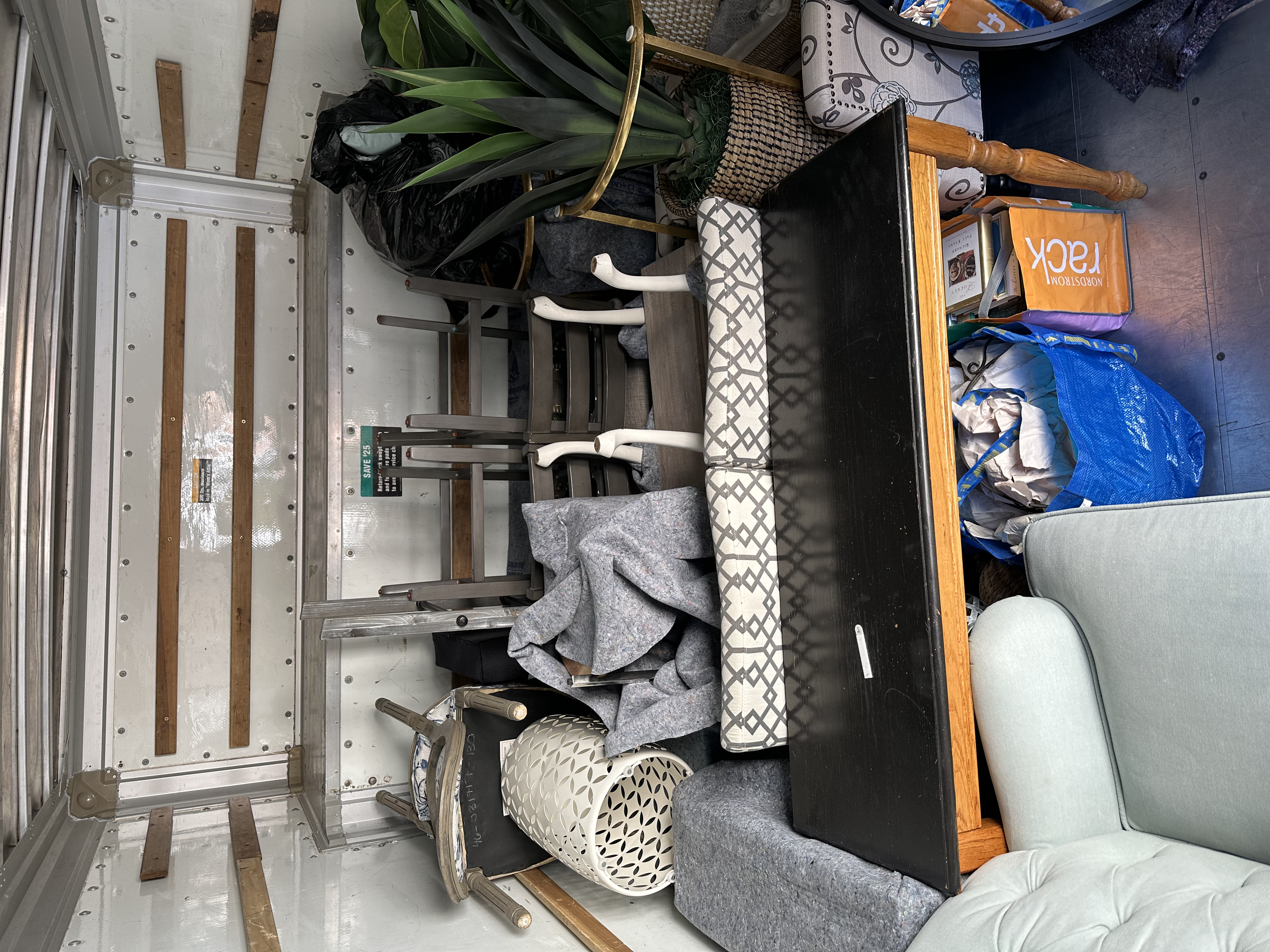 Furniture and boxes loaded — full truck view