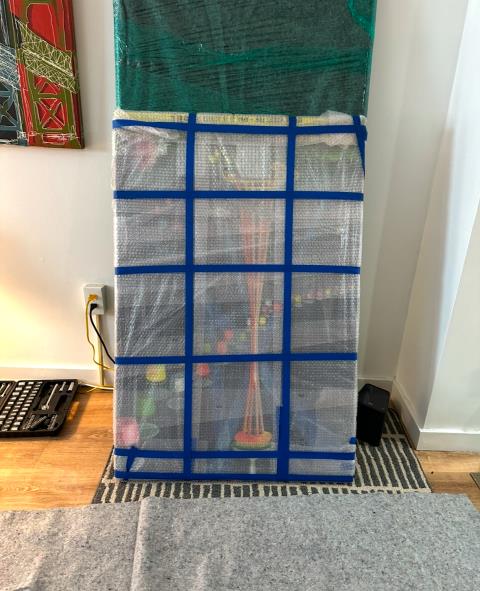 UBox packed with luggage, boxes, and fragile items