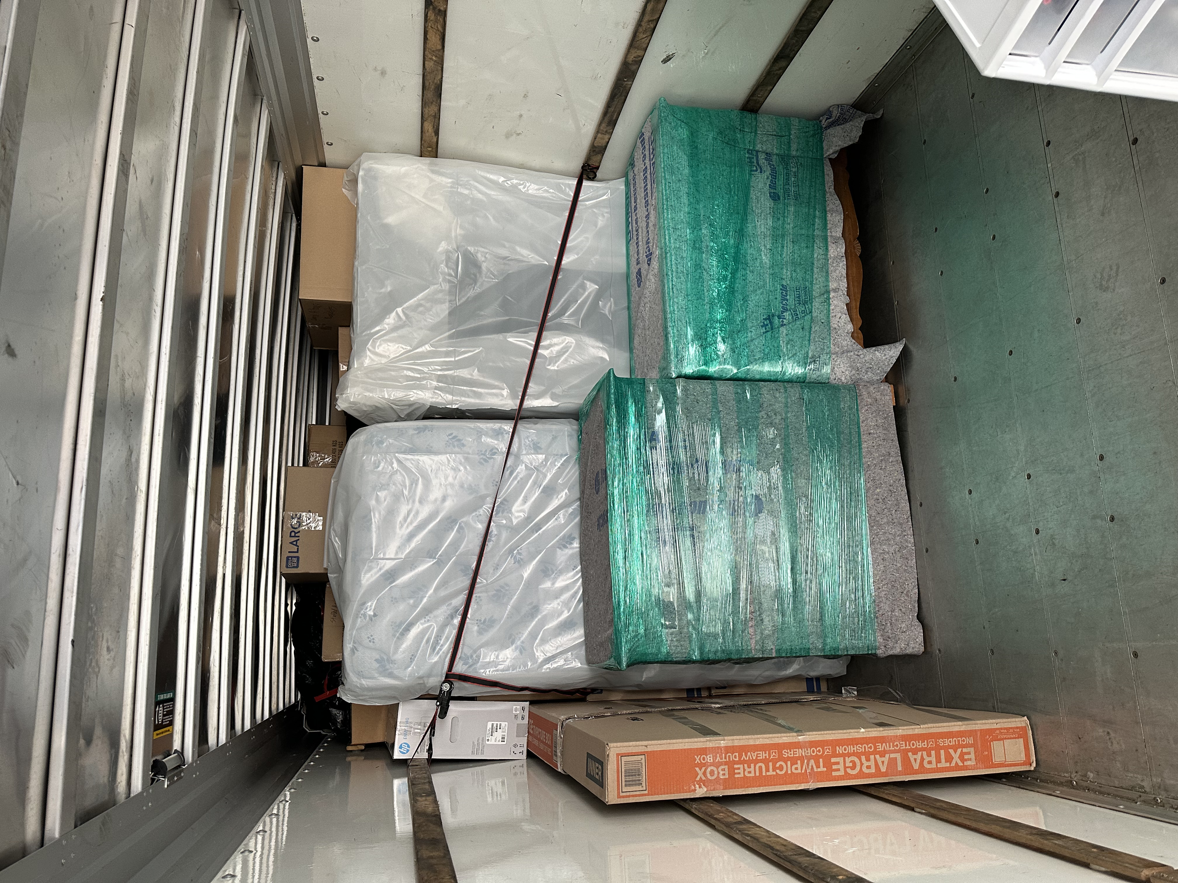 Organized load with dresser and furniture