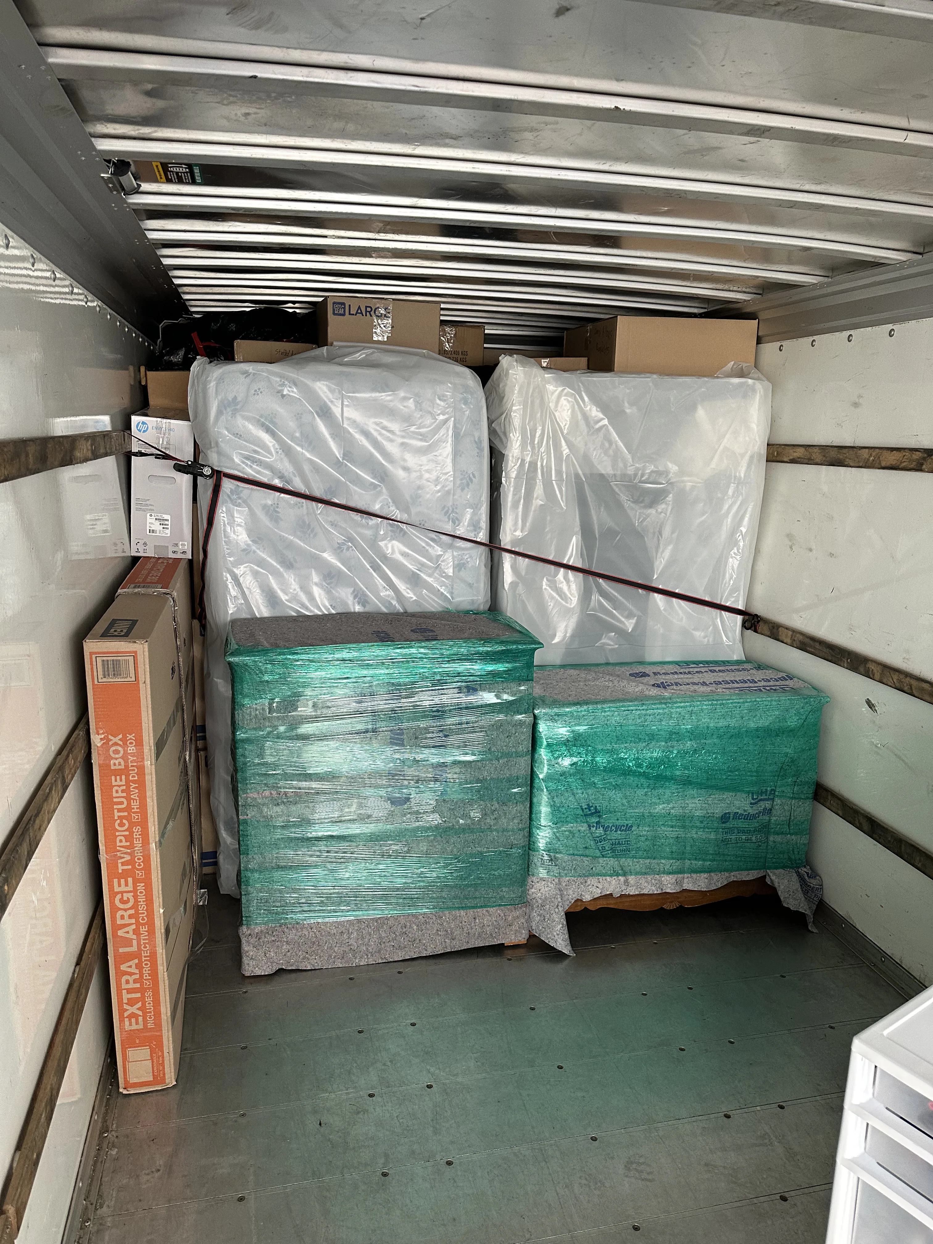 Organized load with dresser and furniture