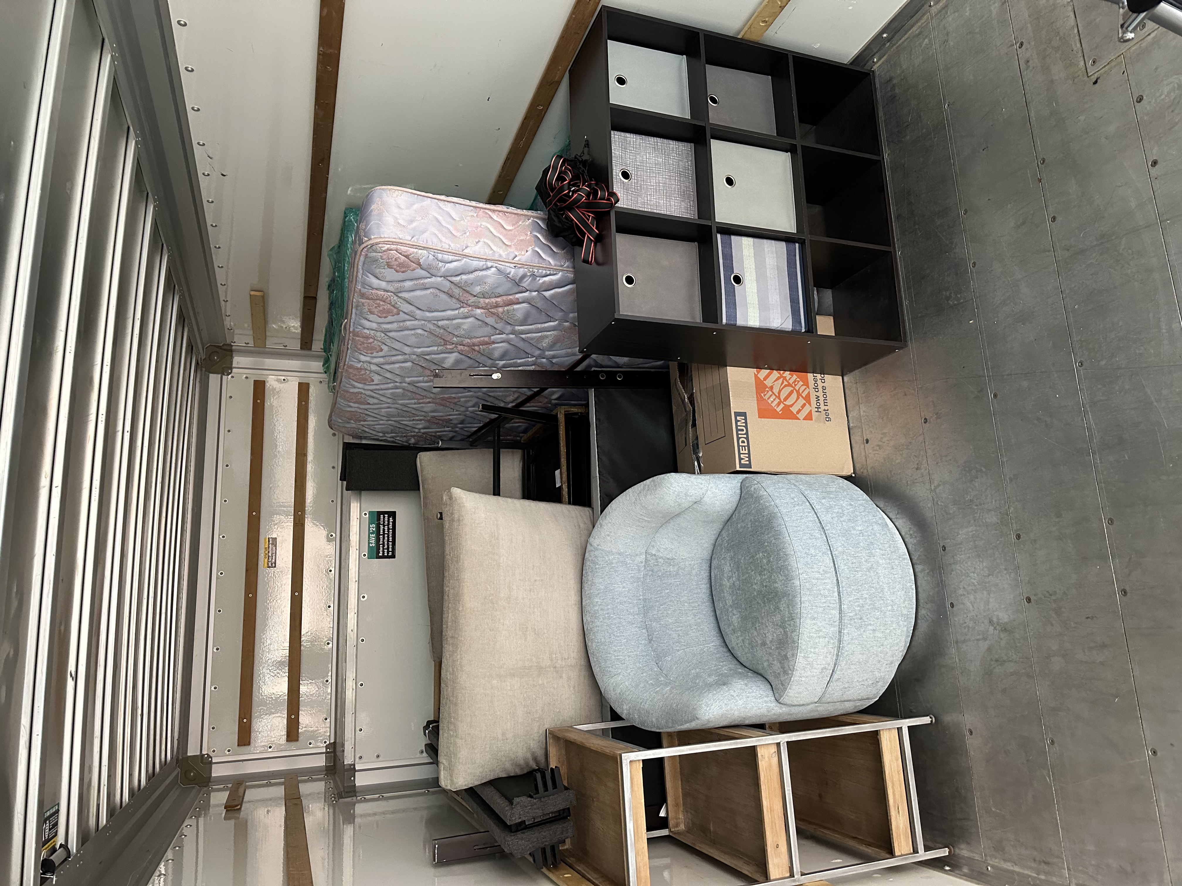 Boxes and furniture loaded in 26ft truck