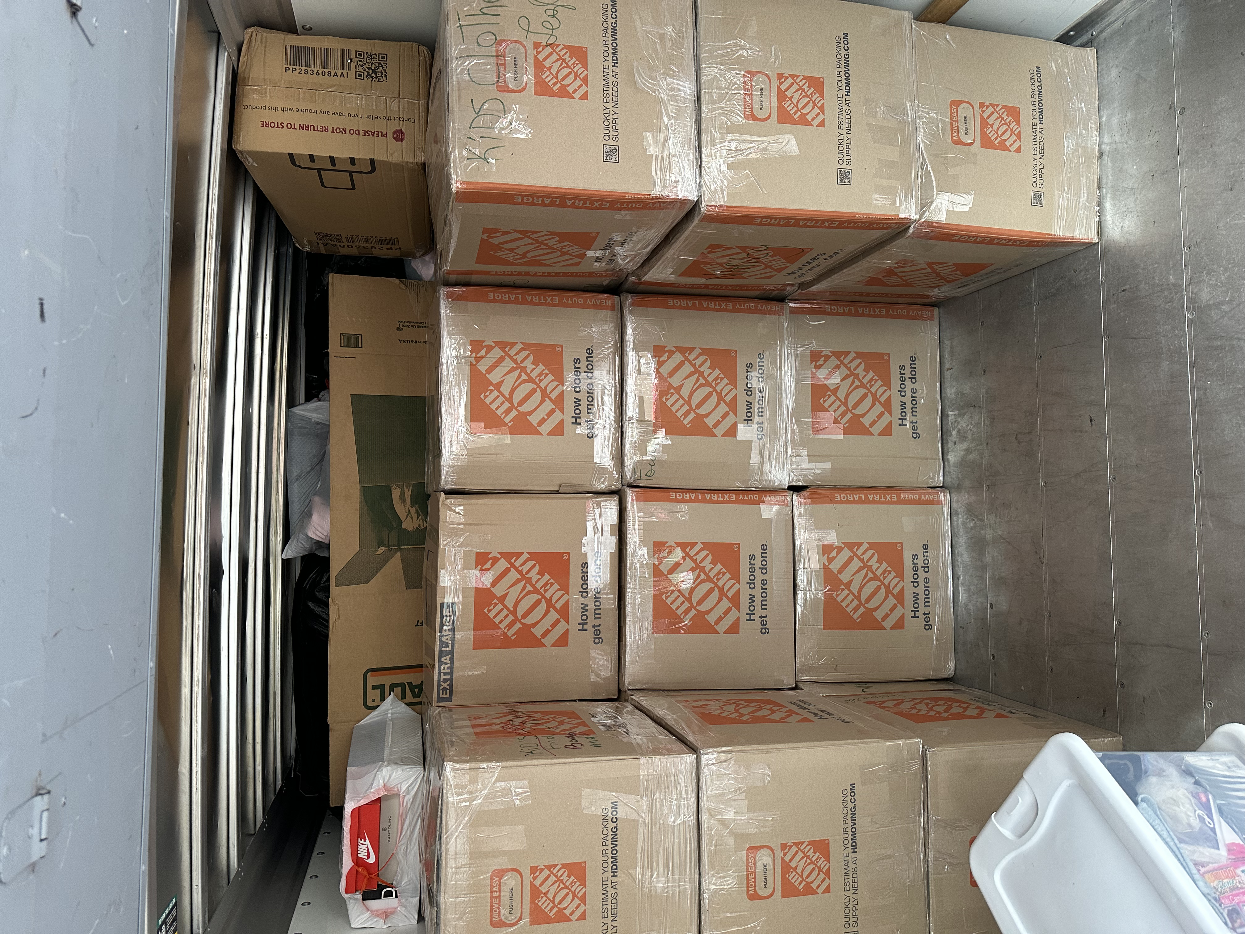 Five UBox containers lined up — large relocation