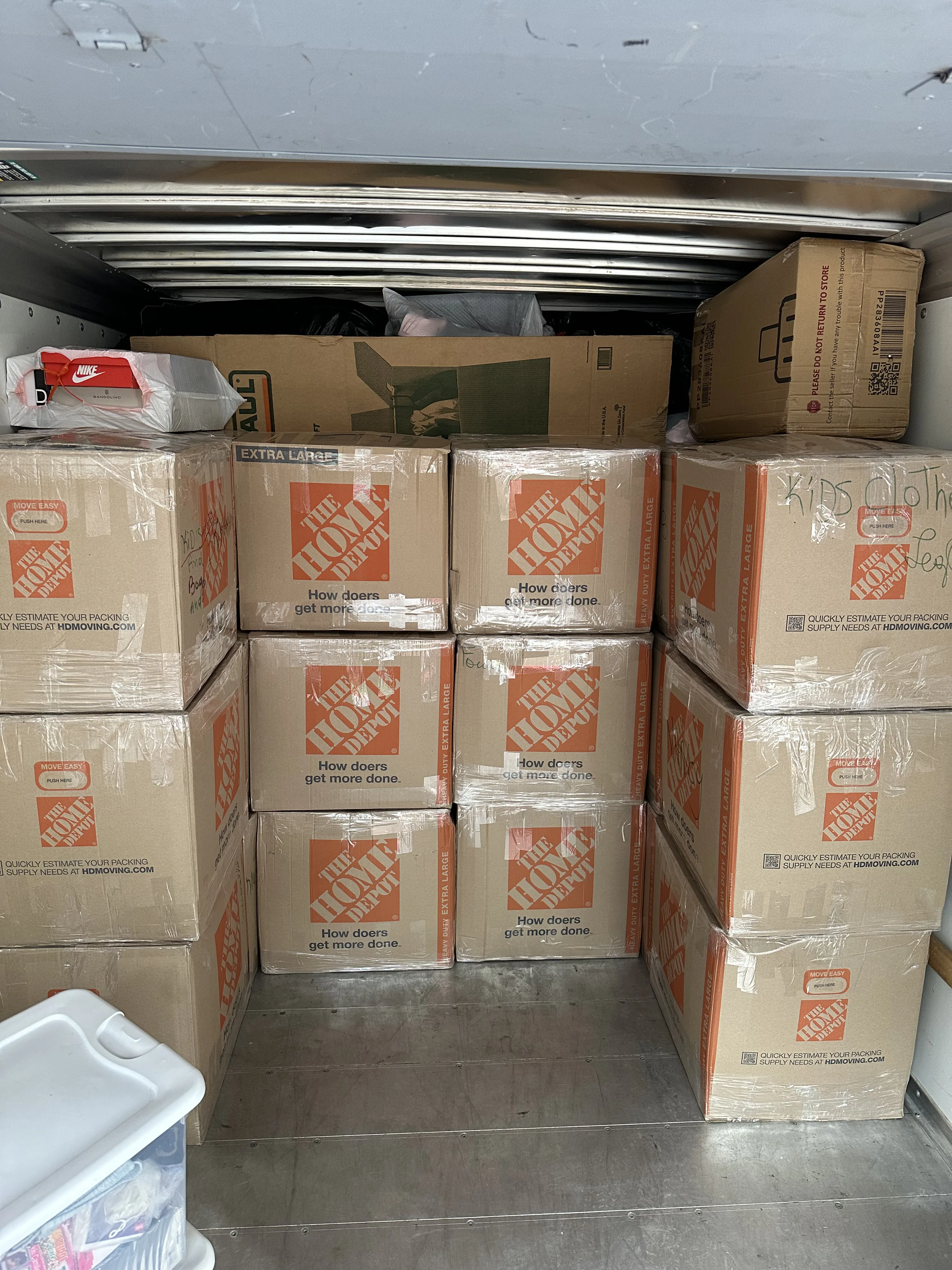 Five UBox containers lined up — large relocation