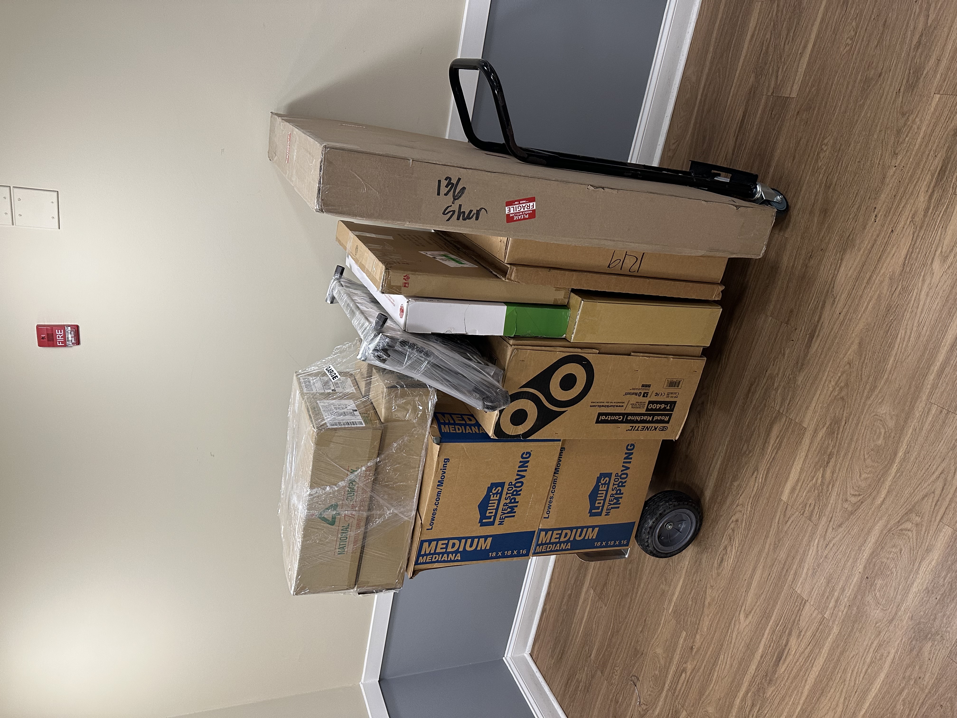 Wrapped couches secured with straps