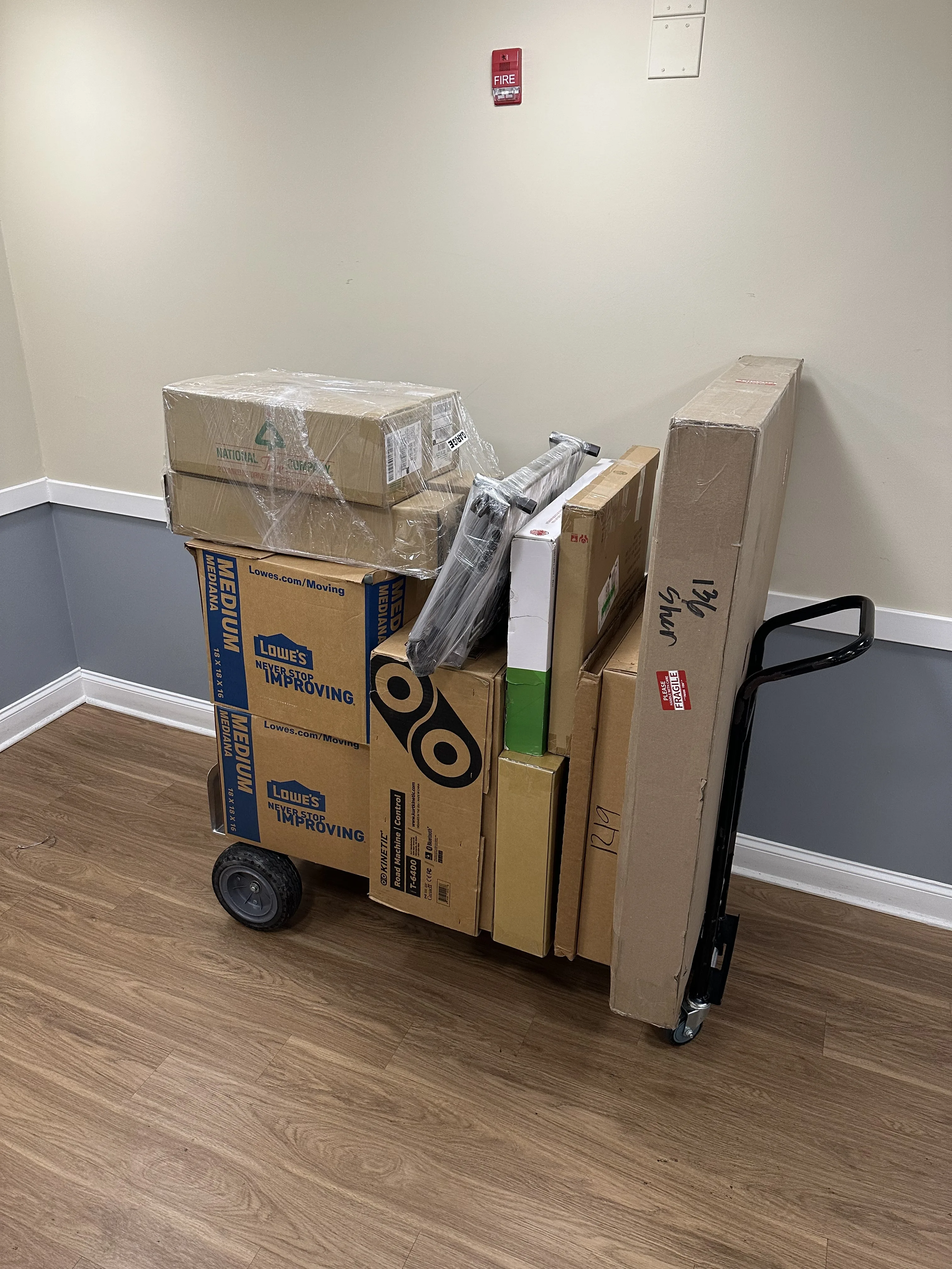 Wrapped couches secured with straps