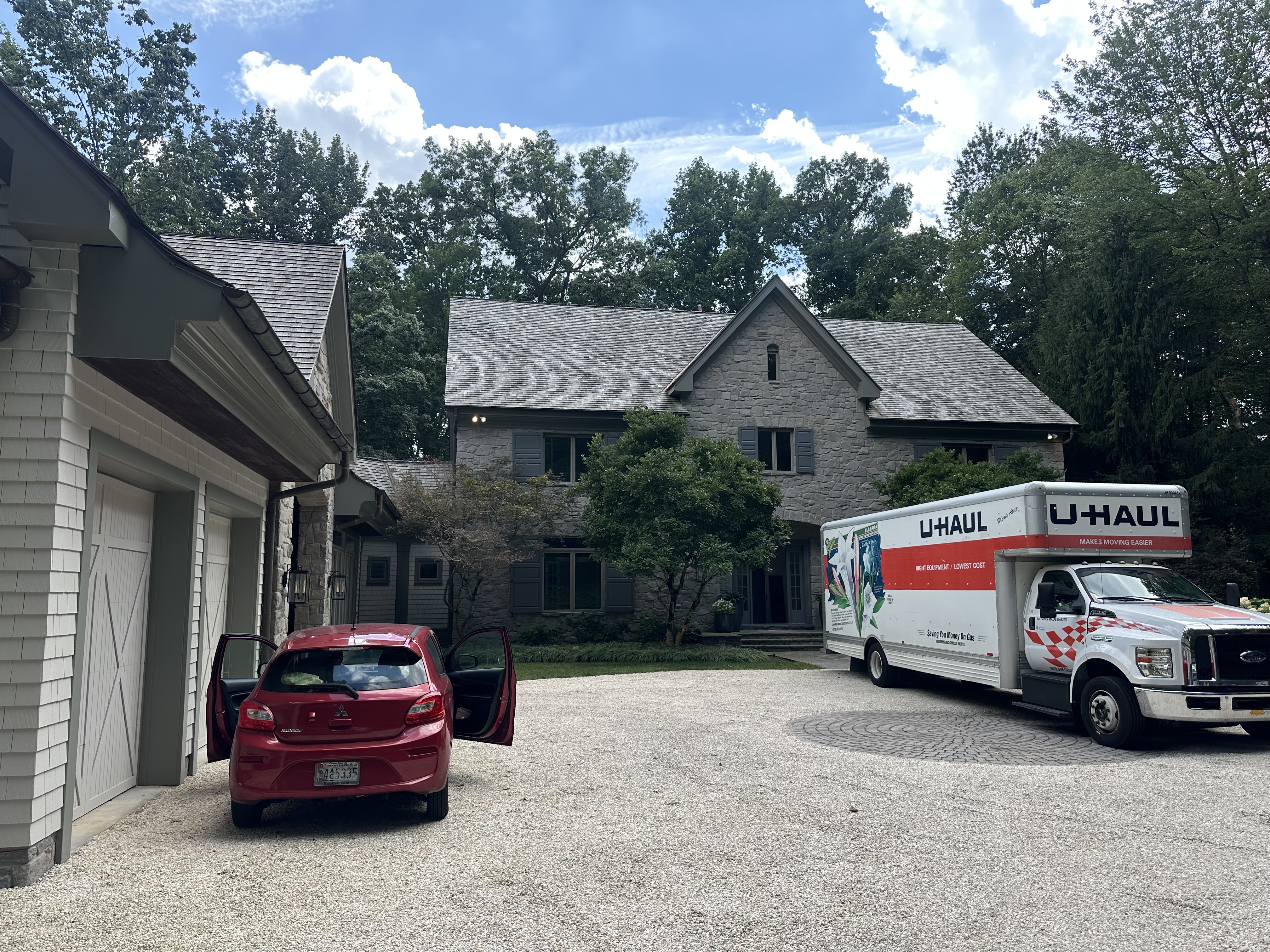 U-Haul truck parked at estate on a sunny day