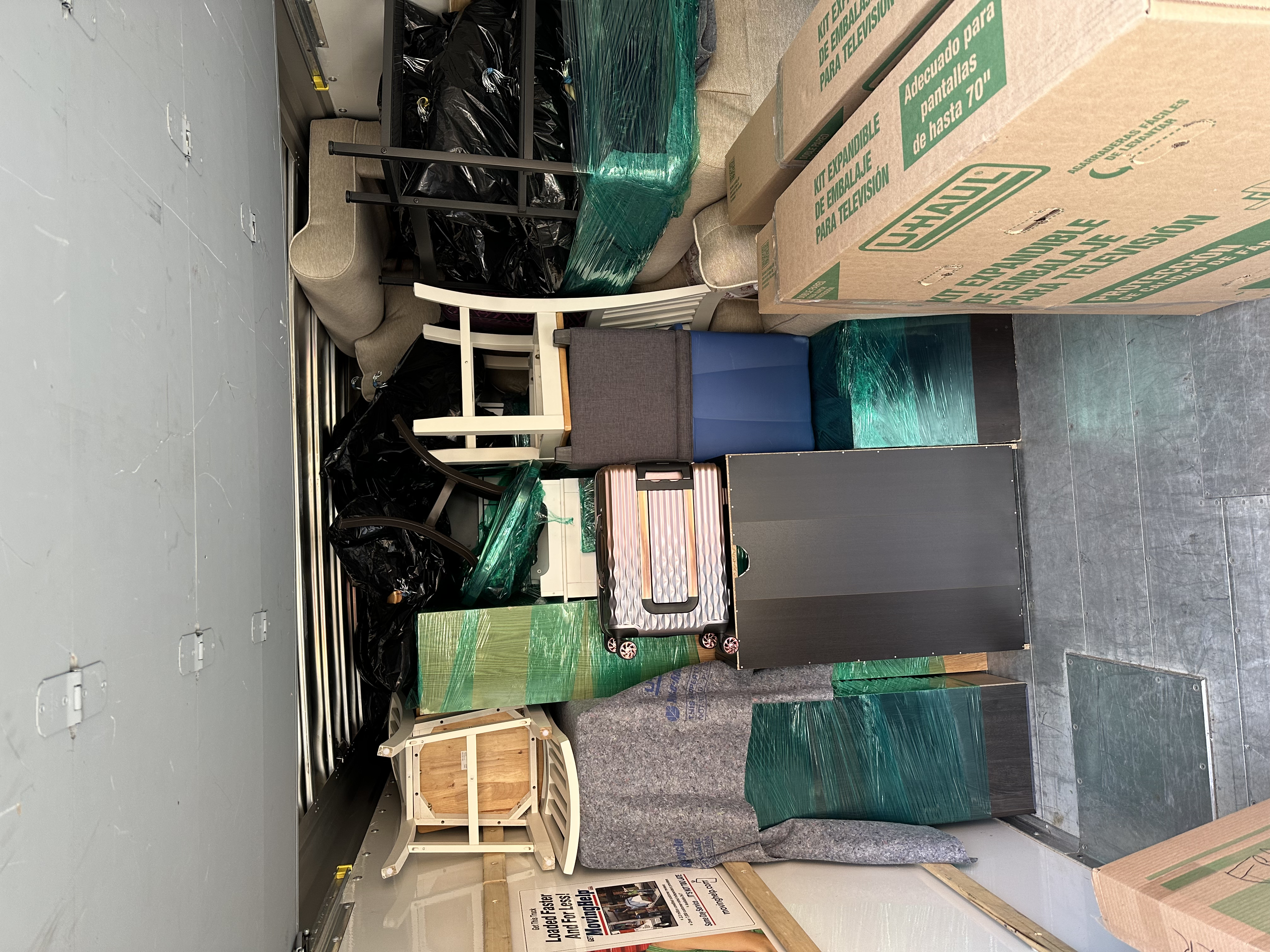 Full truck — furniture and boxes wall to wall