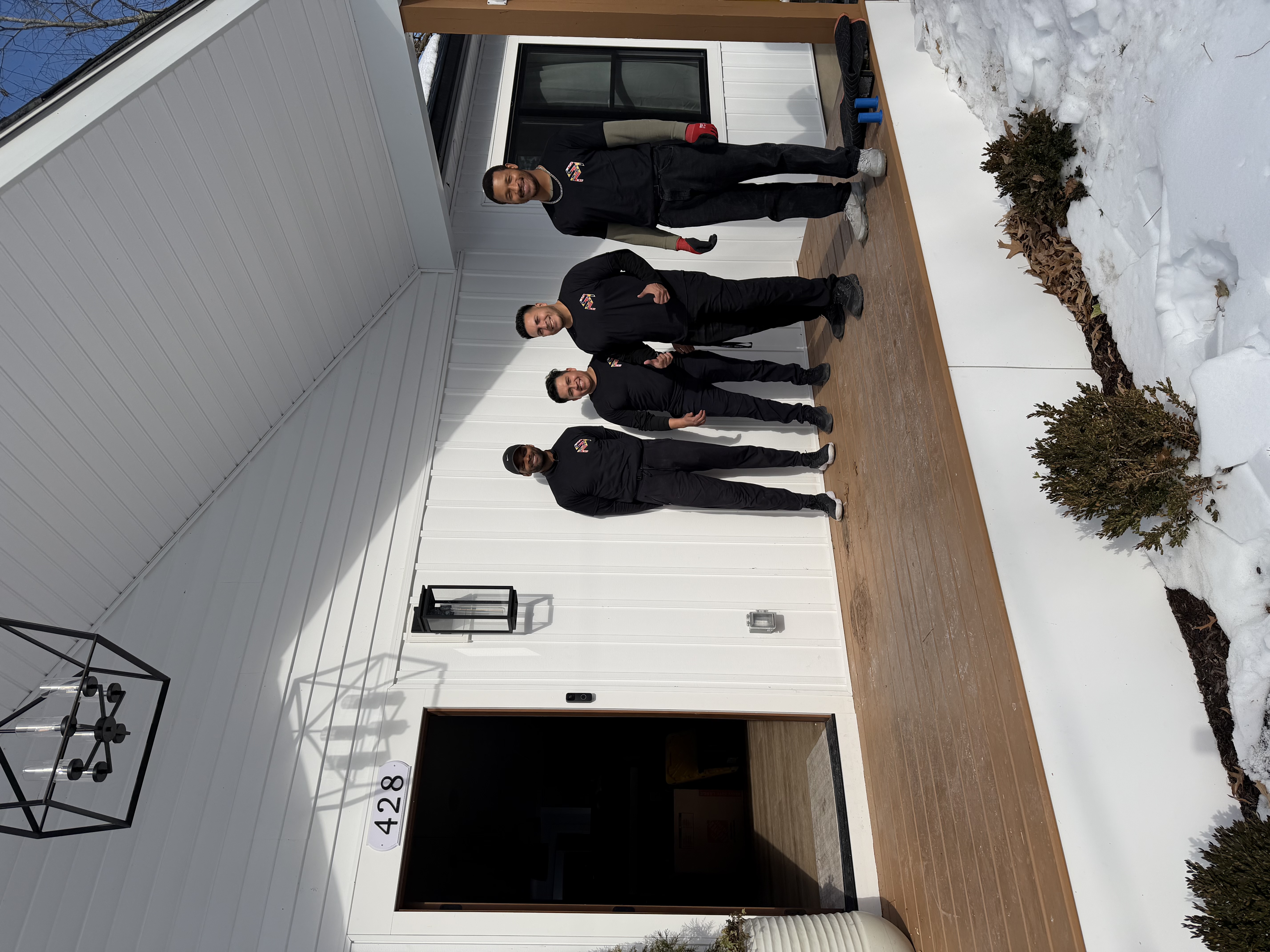 Smart Move crew outside a home in winter