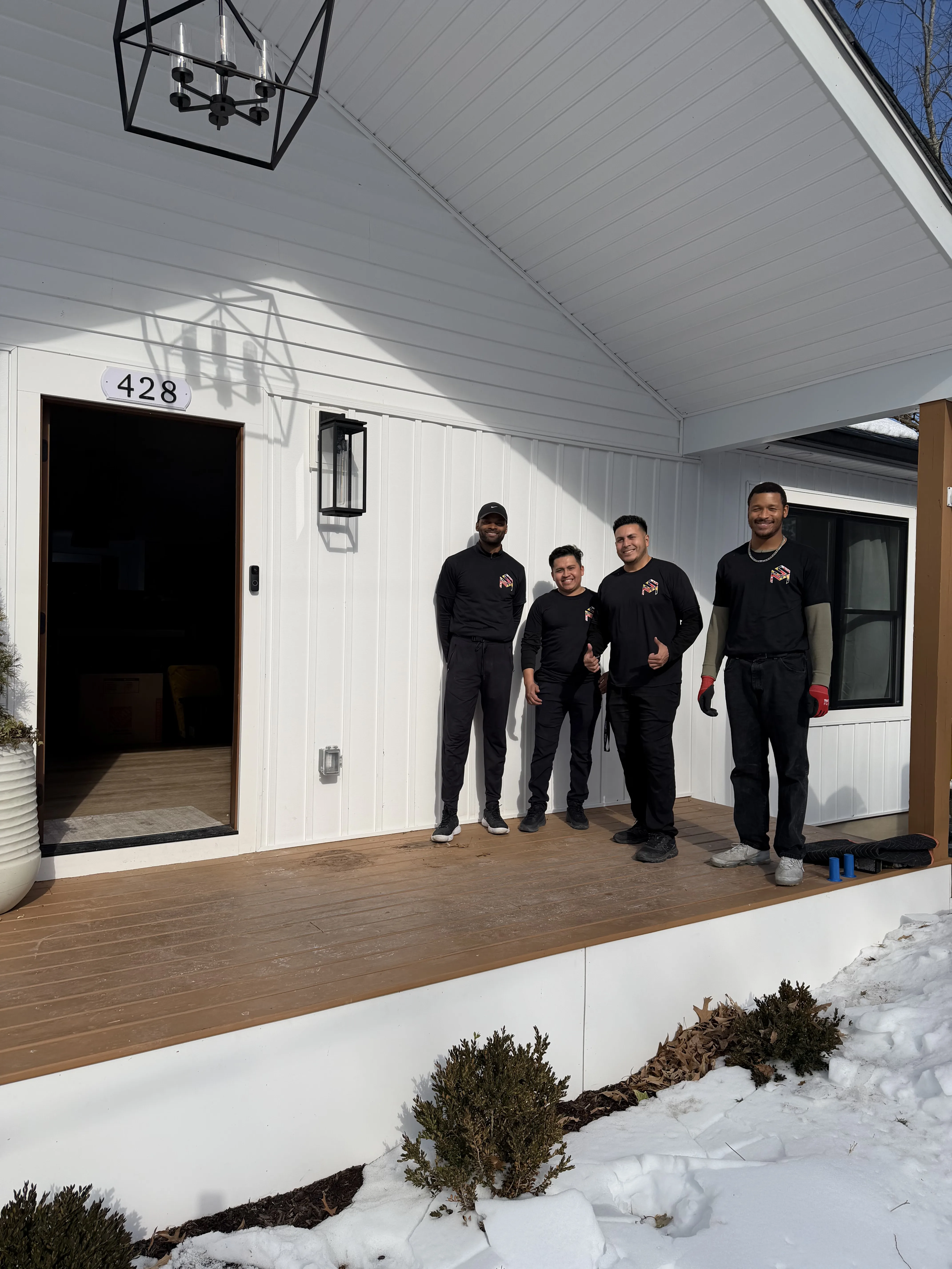 Smart Move crew outside a home in winter
