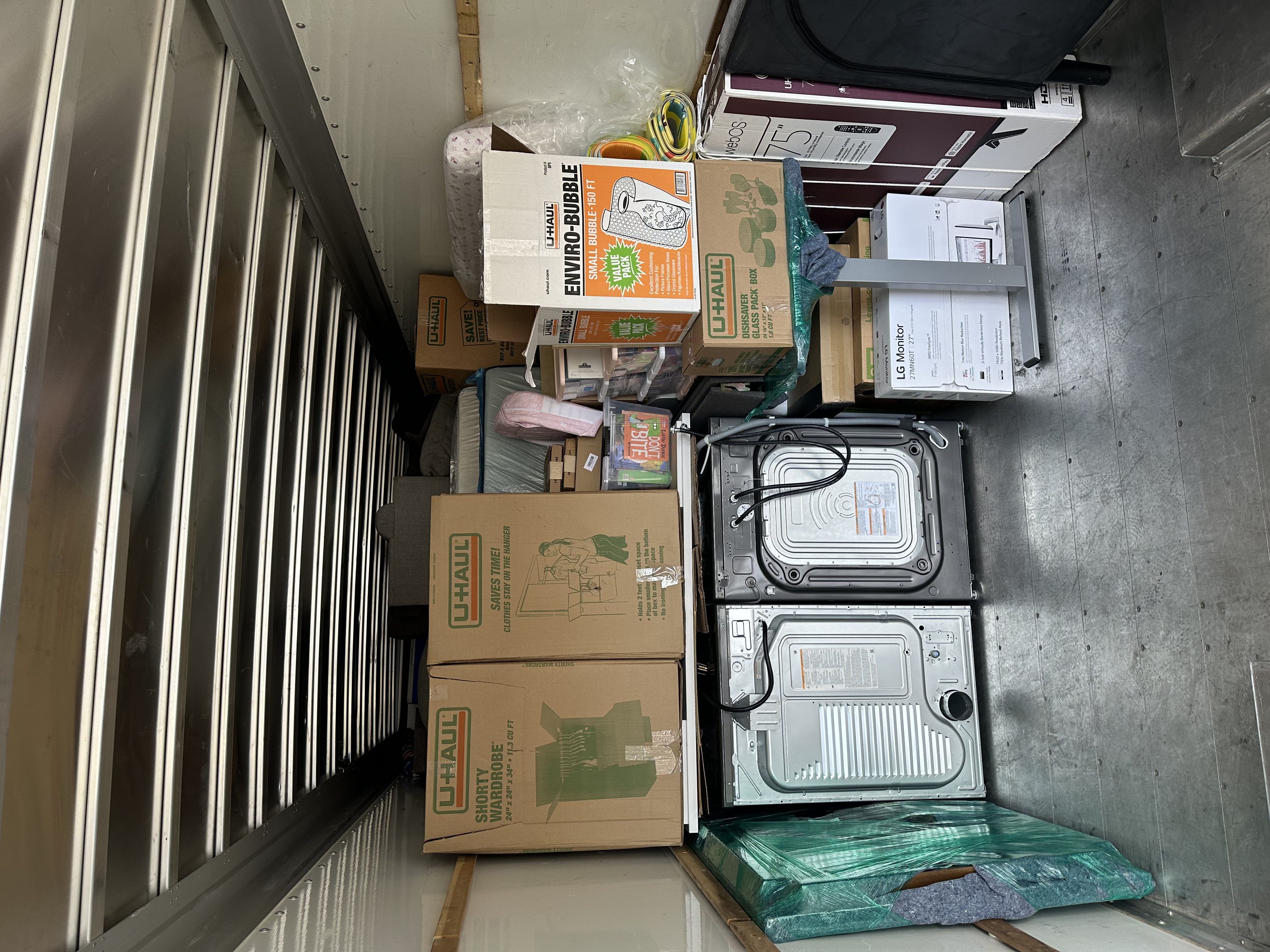 Fully loaded truck — appliances and boxes secured