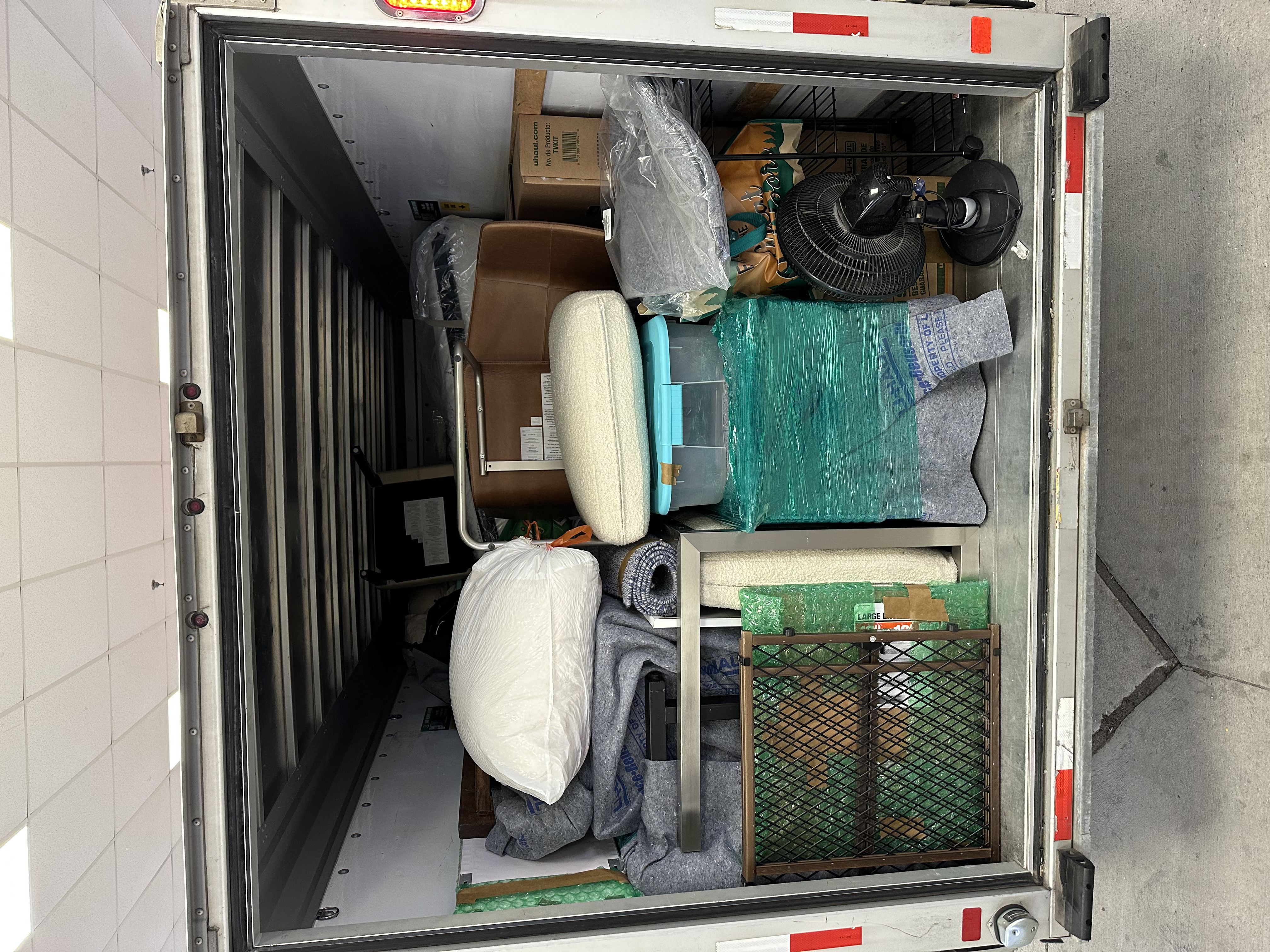 Full truck load — totes, boxes, and wrapped items