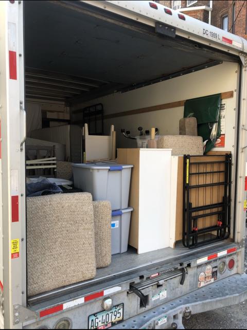 Fully loaded truck — furniture and boxes wall to wall