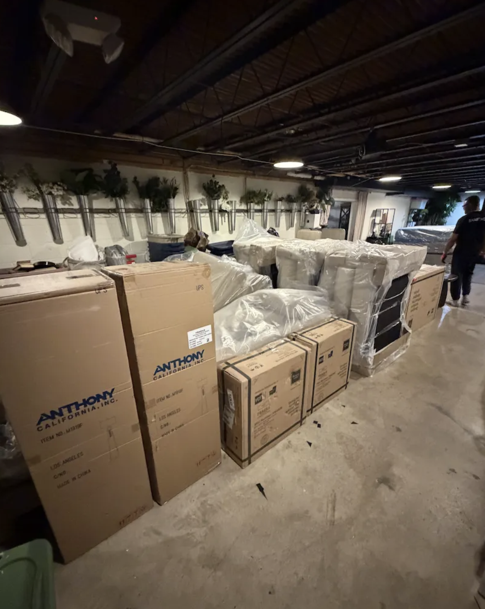 Smart Move crew staging boxes and wrapped furniture for loading