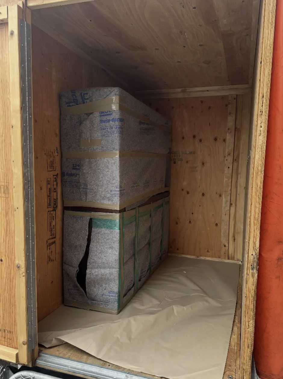 UBox packed with pad-wrapped furniture, neatly stacked